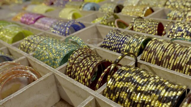 Indian woman traditional and fashionable Fancy bangles in shop