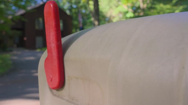 Moving the flag up to indicate mail needing to be picked up.