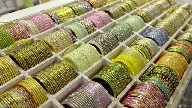 Indian woman traditional and fashionable Fancy bangles in shop