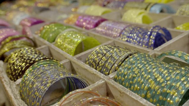 Indian woman traditional and fashionable Fancy bangles in shop