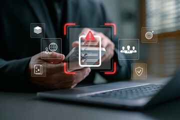 Businessman managing business risks and investment control using mobile technology, with icons of...