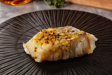 Steamed cod fish fillet with spices
