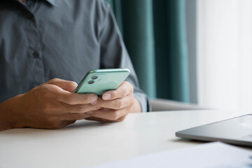 Businessman Calculating Revenue and Planning Business Strategy at Office