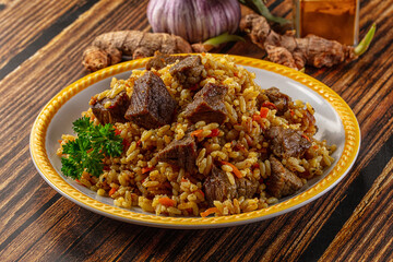 Asian traditional pilaf with beef