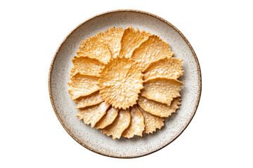 Round golden baked crackers arranged in a circle on a plate isolated on transparent background. Crispy crackers arranged neatly on a plate isolated on white background.