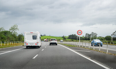 110 km/h road speed sign on Waikato Expressway. North Island. New Zealand.