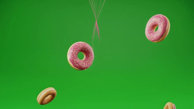 Animated green screen background with a bunch of colorful balloons, pink donuts flying through the air, and scattered flowers&mdash;perfect for festive overlays, playful intros, or whimsical celebration sce