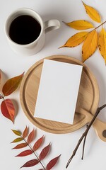 Coffee cup and autumn leaves