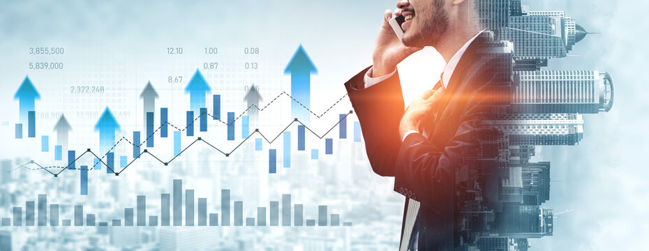 A confident professional man engages in a phone conversation while surrounded by visual data representing business growth and market analysis in an urban setting. Scalp