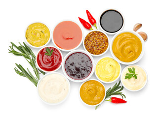Different sauces and herbs isolated on white, top view