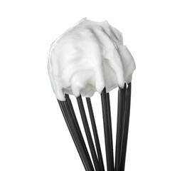 Whisk with whipped egg whites isolated on white