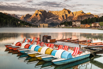 Colorful Boats on Lake Misurina at Sunrise in the Italian Alps