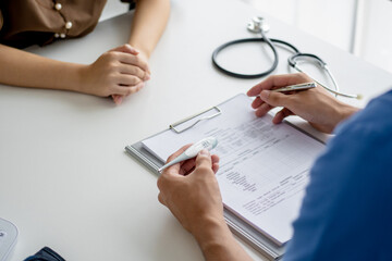  doctor examines a patient during a medical consultation in an office