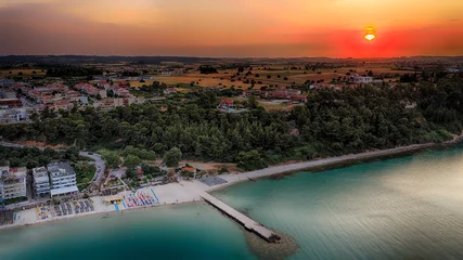 Sunset aerial view of Kallithea beach and coastline in Halkidiki, Greece © Svetoslav Sokolov