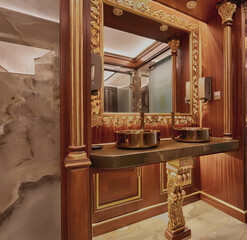 Luxury bathroom interior with marble and golden decorative elements