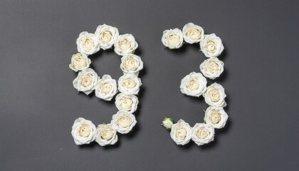Number 93 made out of white roses with black background. Photo for birthday or anniversary party