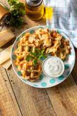 Crispy cheese waffles on a rustic background.