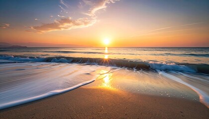 Golden Hour Sunset Over Calm Ocean Waves on Sandy Beach Reflecting Warm Light Across the Horizon