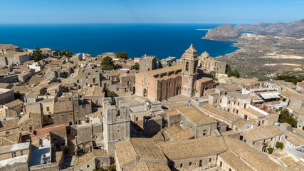 Obraz premium Aerial view of San Giuliano church. It's a Roman Catholic church in the historic center of Erice, Sicily, Italy. It's one of four parish churches in the town. The Mediterranean Sea is in background.