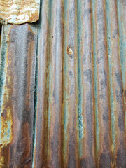 Old rusty metal fence surface background with a rough grunge texture