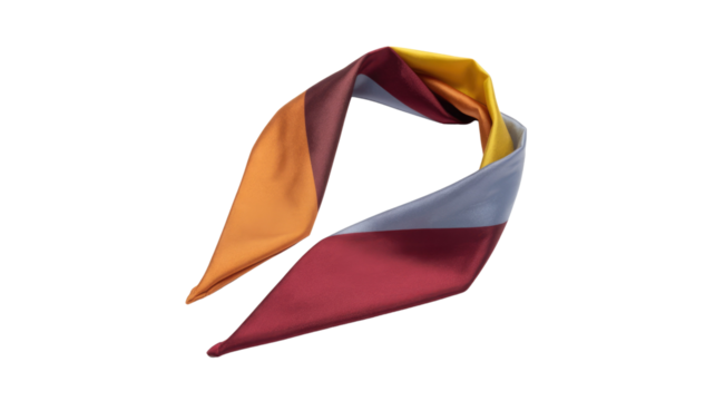 A stylish, multicolored silk scarf featuring blocks of orange, burgundy, yellow, and grey, elegantly folded on a solid background. background removed