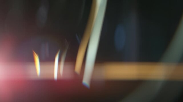 Real Shooted Anamorphic Lens Flare Transition on Black Background in Super Slow Motion.