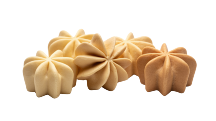A delightful collection of textured, star-shaped cookies or meringues, varying in light, neutral colors, against a solid transparent background. background removed