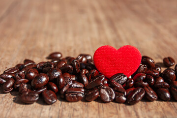 close up roast coffee bean on grunge wood table.
