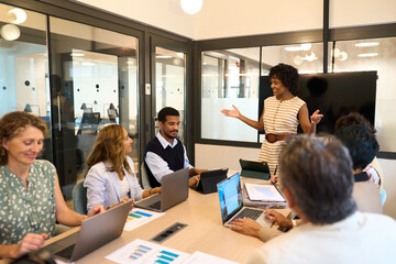 African american businesswoman presenting during office meeting