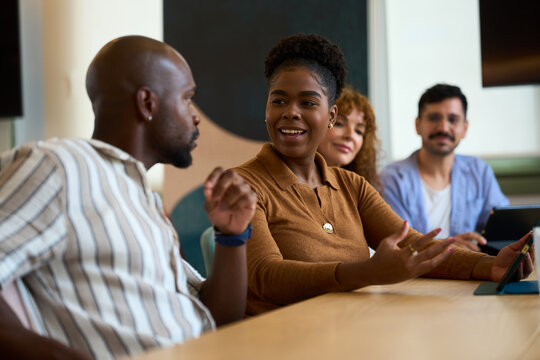 Diverse business team collaborating during office meeting