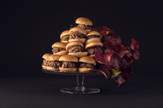 Gourmet cocktail buffet with charcuterie, cheese and mini burgers - Powered by Adobe