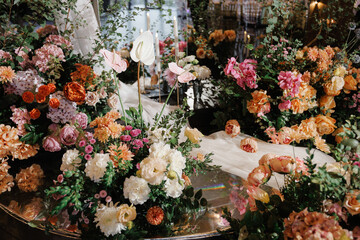 Extravagant flower centerpiece styled with warm candlelight