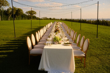 Al fresco party featuring floral decor and farm fresh dishes