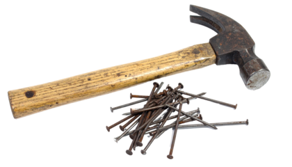 Isolated on white background hammer and nails — essential carpentry tools symbolizing construction, craftsmanship, repair, and maintenance. Perfect for DIY projects, building concepts, home improvemen