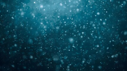 Fototapeta premium Blue Bokeh Snowfall Background with Soft Winter Glow