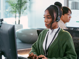 Expert Female Customer service representative agent working in Call Center office. Female Consultant, IT Support Operator working on desktop computer helping, talking with Client, Contact support.