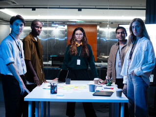 Portrait of Diverse Businesspeople, Software Developer team looking at camera with confident expression standing in modern tech company office. Group of successful software engineer, business people.