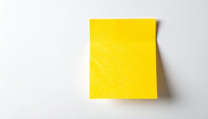 Yellow sticky note with hand-drawn smiley face on white background.