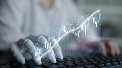 A robotic hand interacts with financial data on a keyboard, representing the integration of technology and finance. The image illustrates growth trends and advanced analytics. Impute