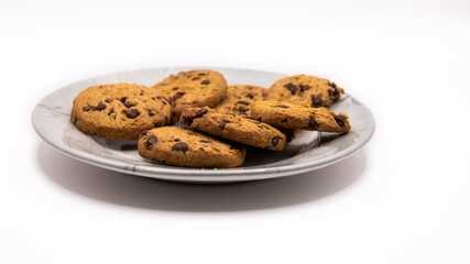 Plate of Chocolate Chip Cookies on White Background