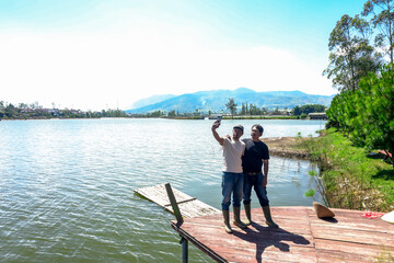 Two Friends Capturing Joyful Memories With Selfie by Serene Lake