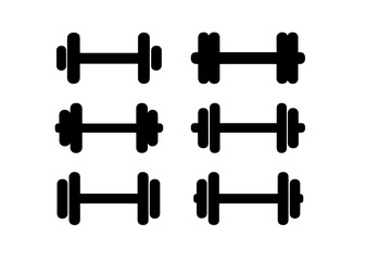 Dumbbells arranged in a grid pattern illustrating various weights and sizes in a fitness setting