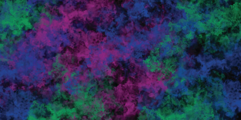 Colorful Abstract Watercolor Splatter Texture with Blended Hues of Purple Pink Green and Blue on Dark Background