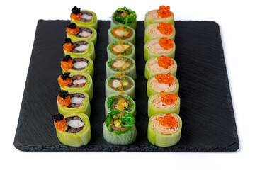 Set of 3 sushi rolls with red caviar isolated