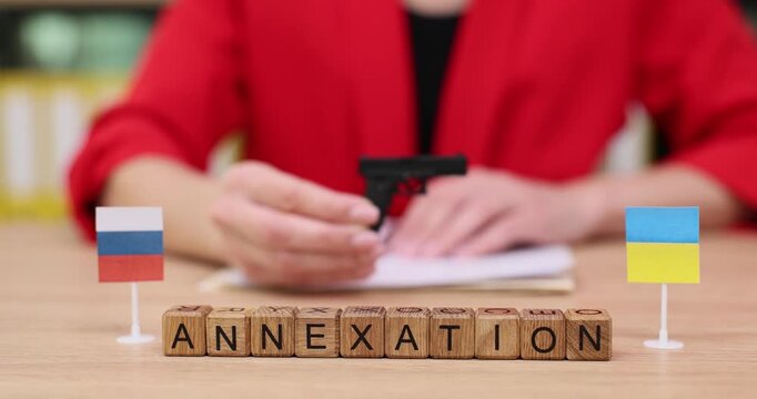 Exploring the themes of power and conflict through symbols of annexation and unrest