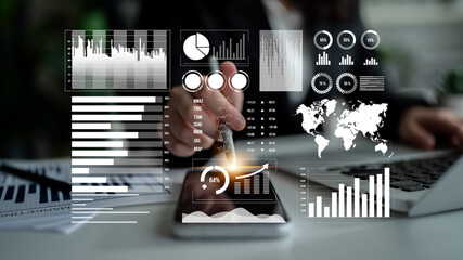 A user interacts with a smartphone showing dynamic graphs and charts, ideal for showcasing modern business analysis and data visualization techniques. Impute