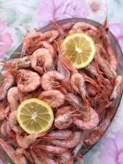 Fresh seafood on ice with lemon