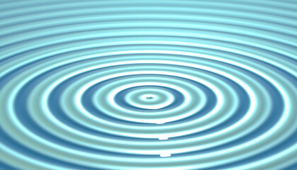 Concentric circles expanding on surface of blue water
