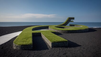 Coastal Grassy Sculpture on Dark Volcanic Sand.
