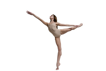 ballerina with beautiful feet poses in a photo studio, a ballerina in leotard shows an arabesque attitude